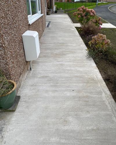 Disability Access Work completed for local authority residents. Concreted pathway and ramp.